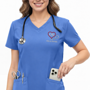 Custom medical scrubs featuring a small embroidered dental office logo and employee name on the left chest