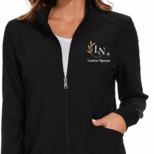 Custom wellness clinic scrubs with a small embroidered logo and provider name on the left chest