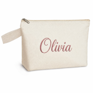 Personalized canvas wristlet pouch embroidered with Olivia in cursive lettering